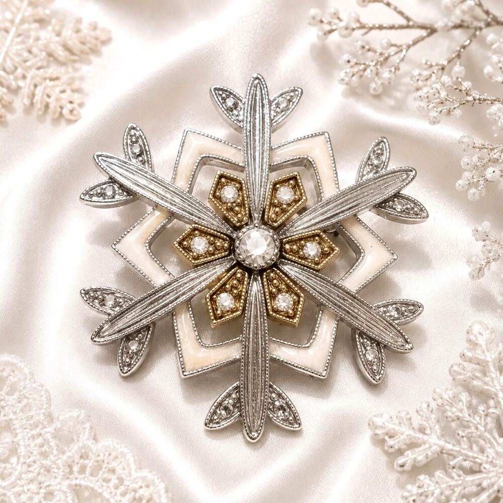 Liz Claiborne Silver and Gold Tone Enameled Rhinestone Snowflake Brooch